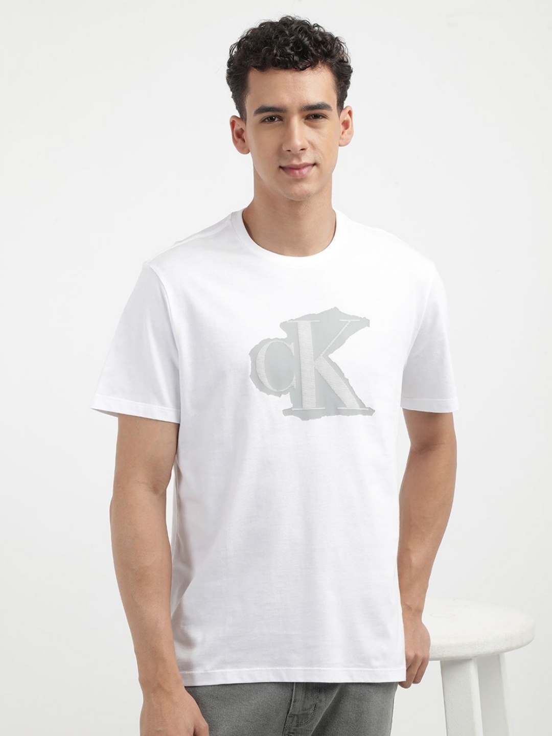 

Calvin Klein Jeans Men Graphic Printed Round Neck Cotton T-shirt, White