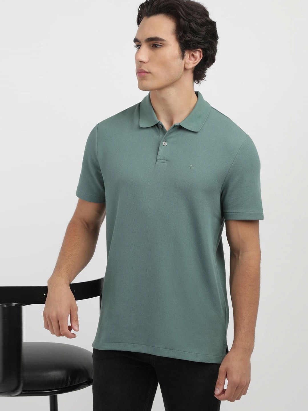 

Calvin Klein Jeans Men Solid Polo Collar Cotton T-shirt, Green