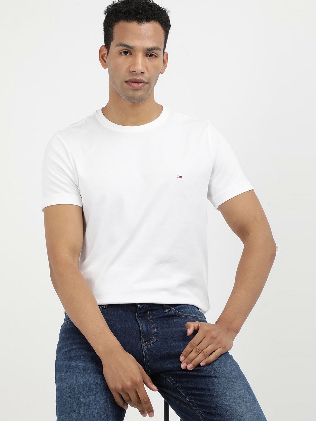 

Tommy Hilfiger Men Solid Round Neck Cotton Slim Fit T-shirt, White