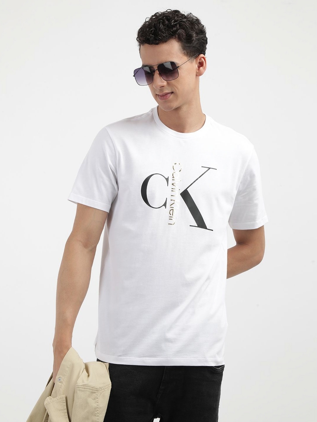 

Calvin Klein Jeans Men Solid Round Neck Cotton T-shirt, White