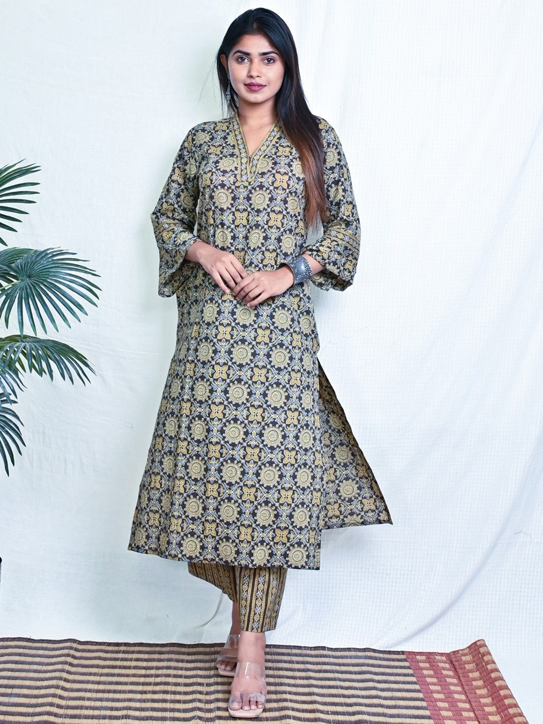 

Earthwear Ethnic Motifs Printed Bell Sleeves Kurta, Mustard