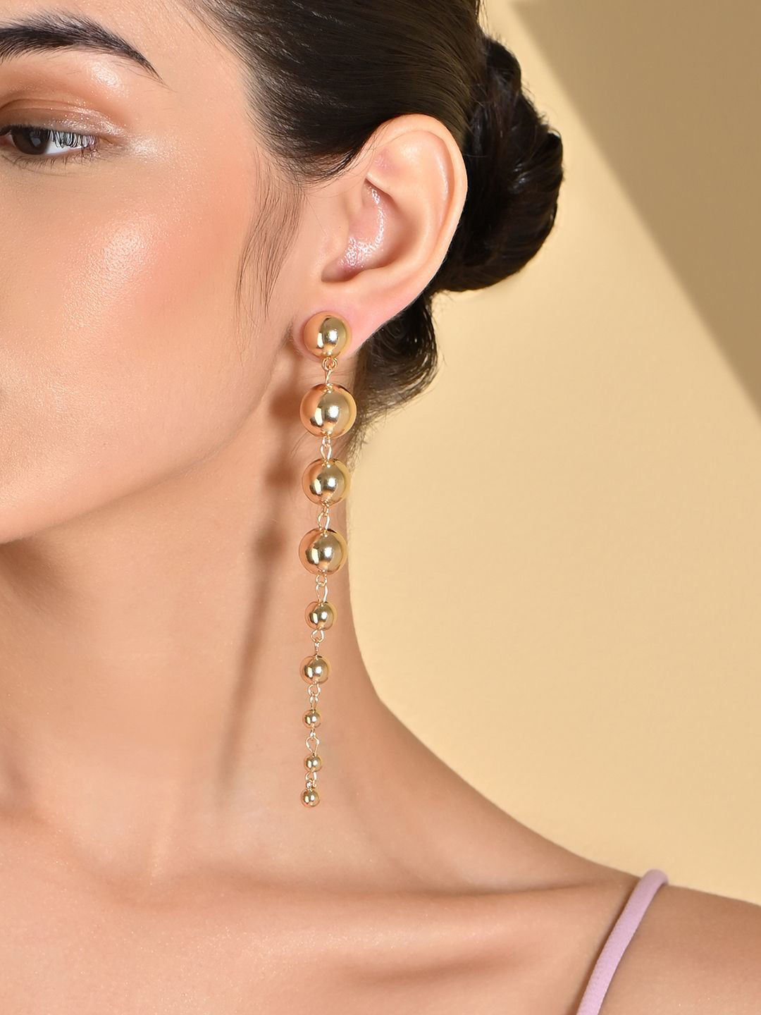 

ToniQ Gold-Plated Contemporary Beaded Drop Earrings