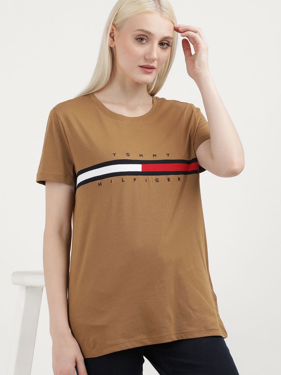 

Tommy Hilfiger Women Solid Round Neck Cotton T-shirt, Brown