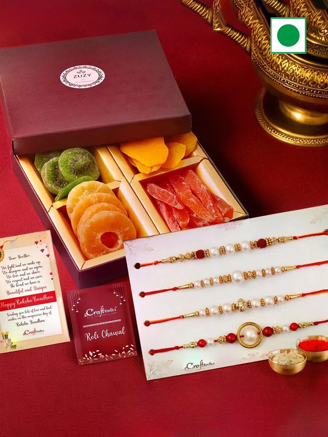 

eCraftIndia Set of Designer Rakhis With Zuzy Sun Dried Fruit Box and Roli Chawal Pack, Red