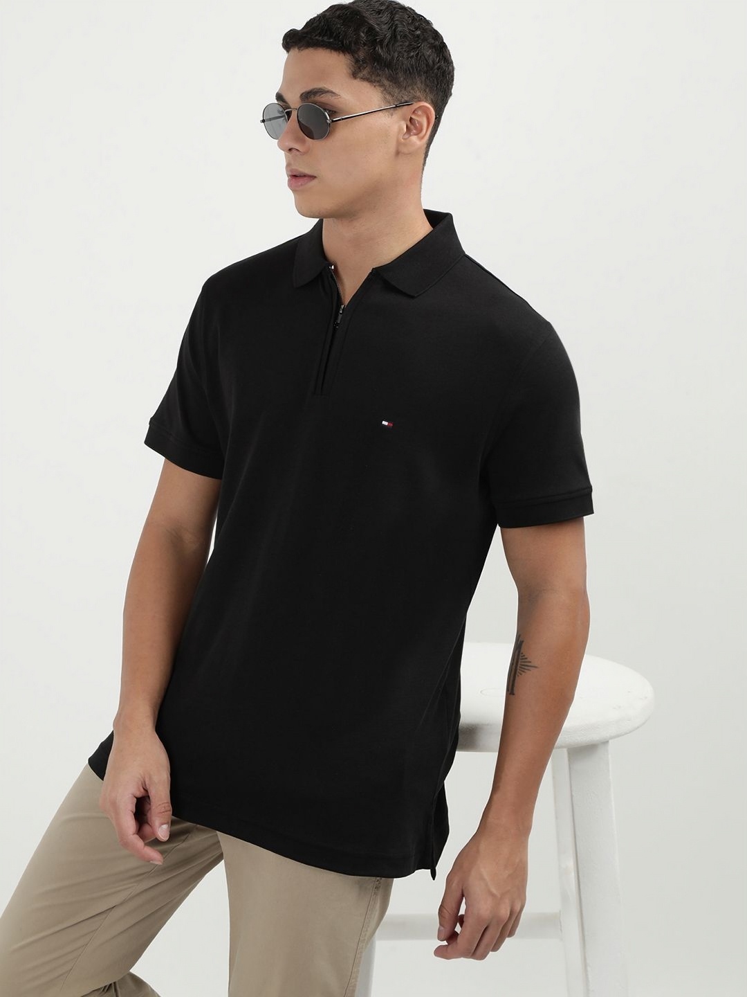 

Tommy Hilfiger Men Solid Polo Collar Cotton T-shirt, Black