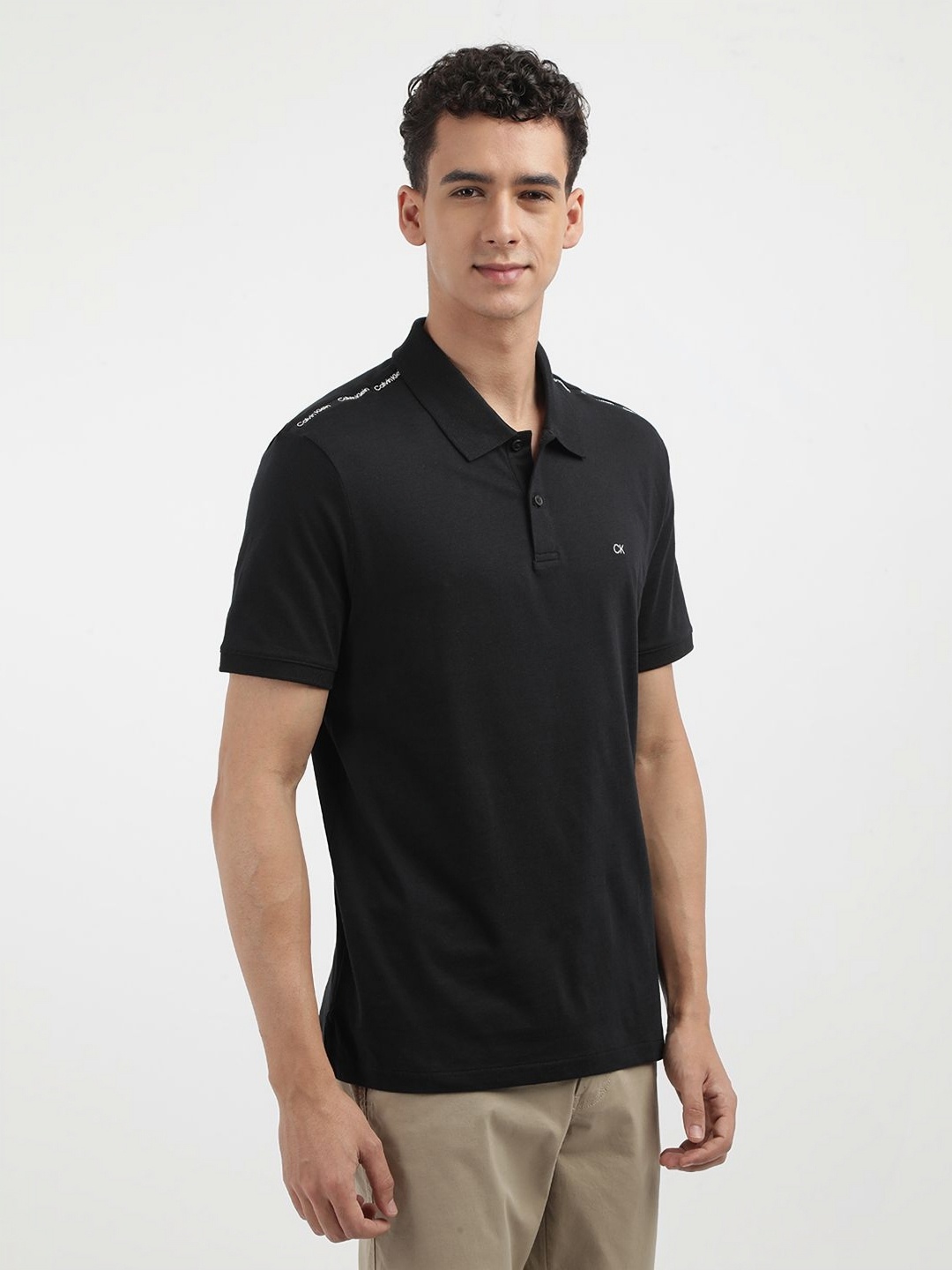 

Calvin Klein Jeans Men Solid Polo Collar Cotton T-shirt, Black