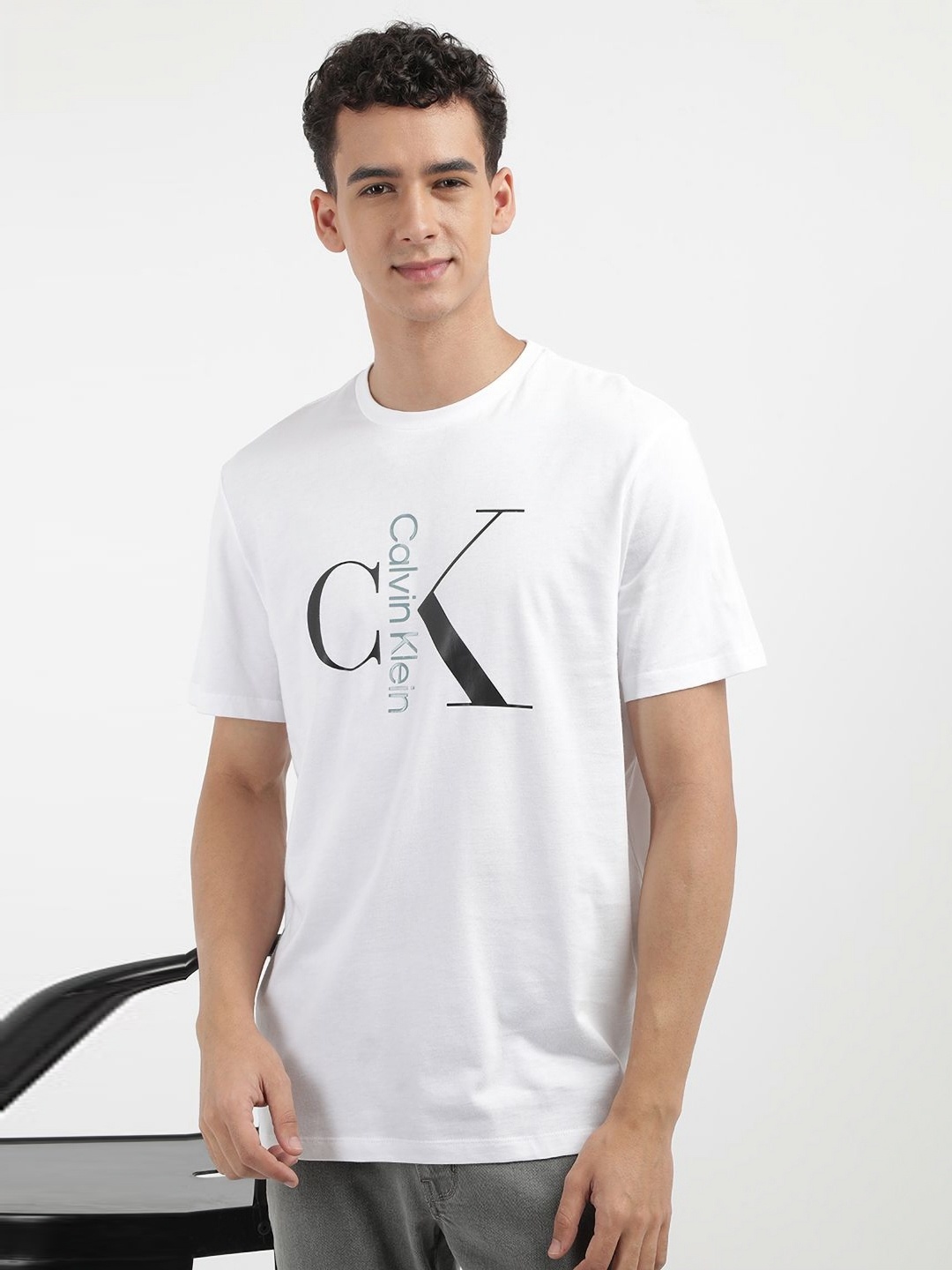 

Calvin Klein Jeans Men Typography Printed Round Neck Cotton T-shirt, White