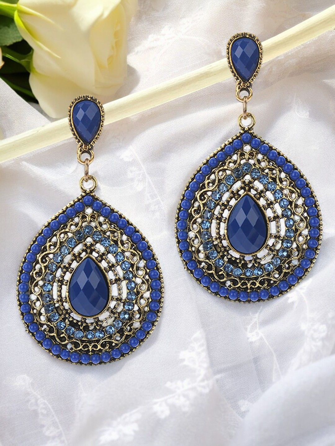 

Anouk Gold-Toned Teardrop Shaped Crystals Studded Drop Earrings