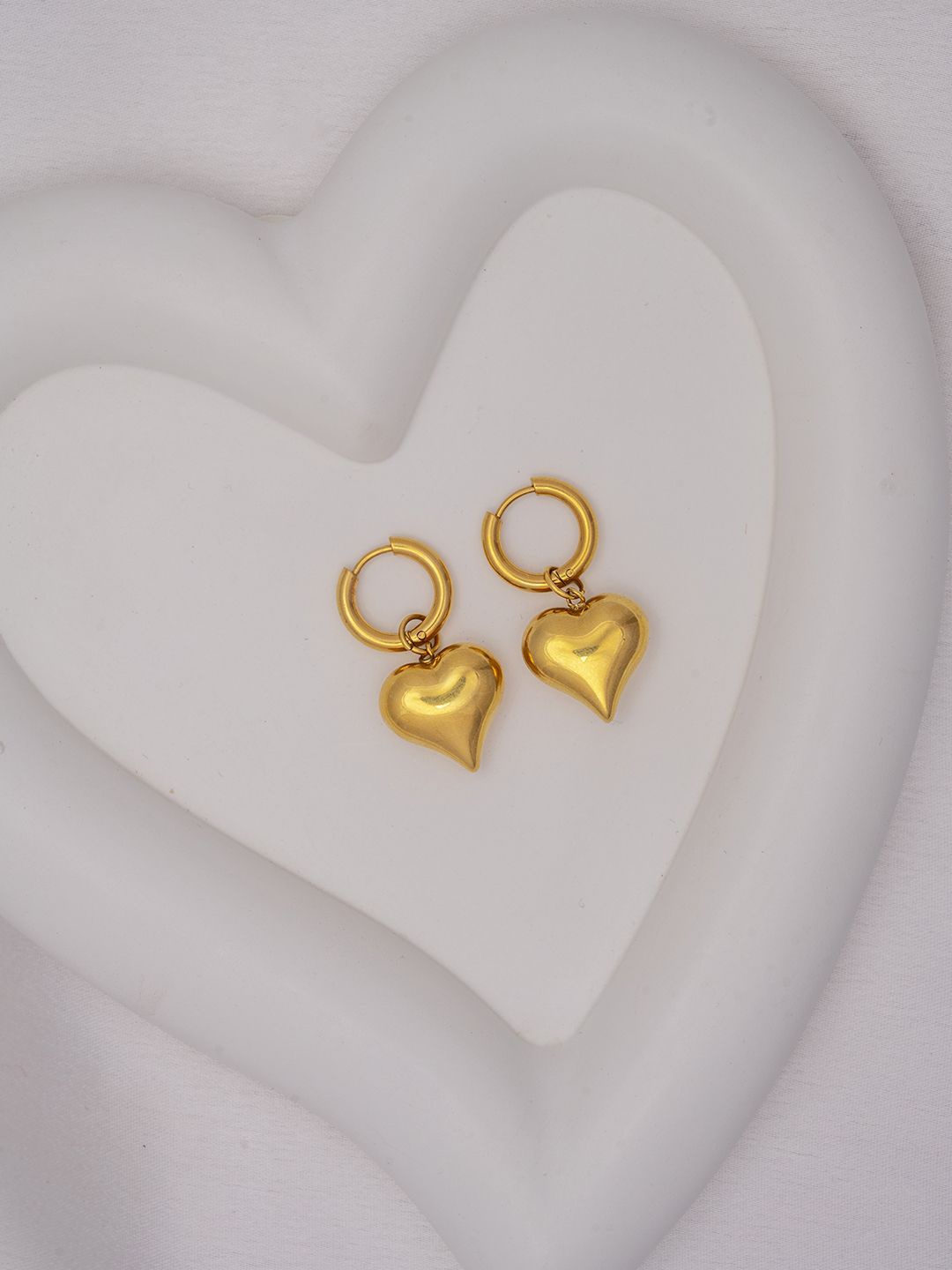 

Perfectly Average Gold-Plated Stainless Steel Medium Heart Shaped Hoop Earrings