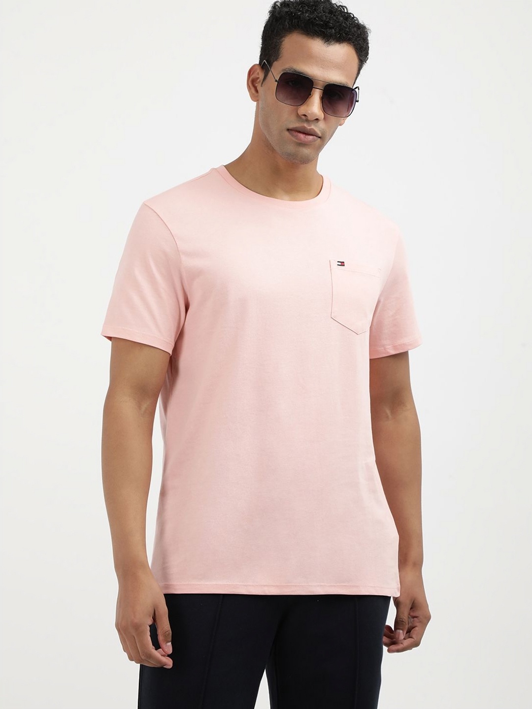 

Tommy Hilfiger Men Solid Round Neck Cotton T-shirt, Pink