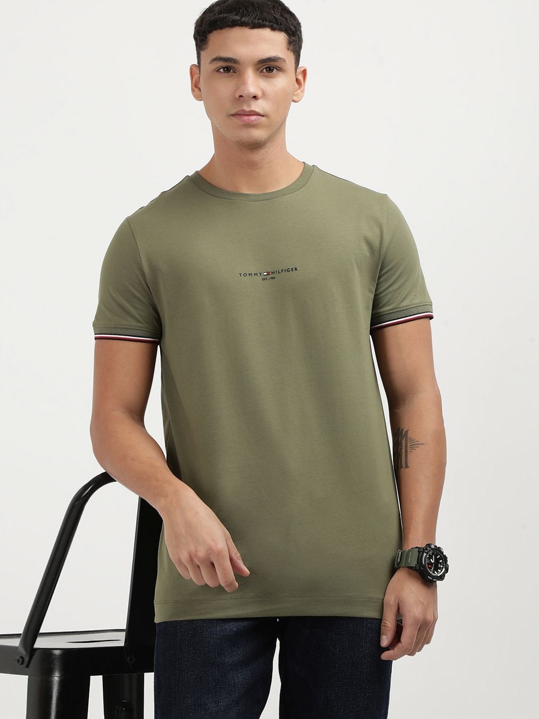 

Tommy Hilfiger Men Solid Round Neck Cotton T-shirt, Green