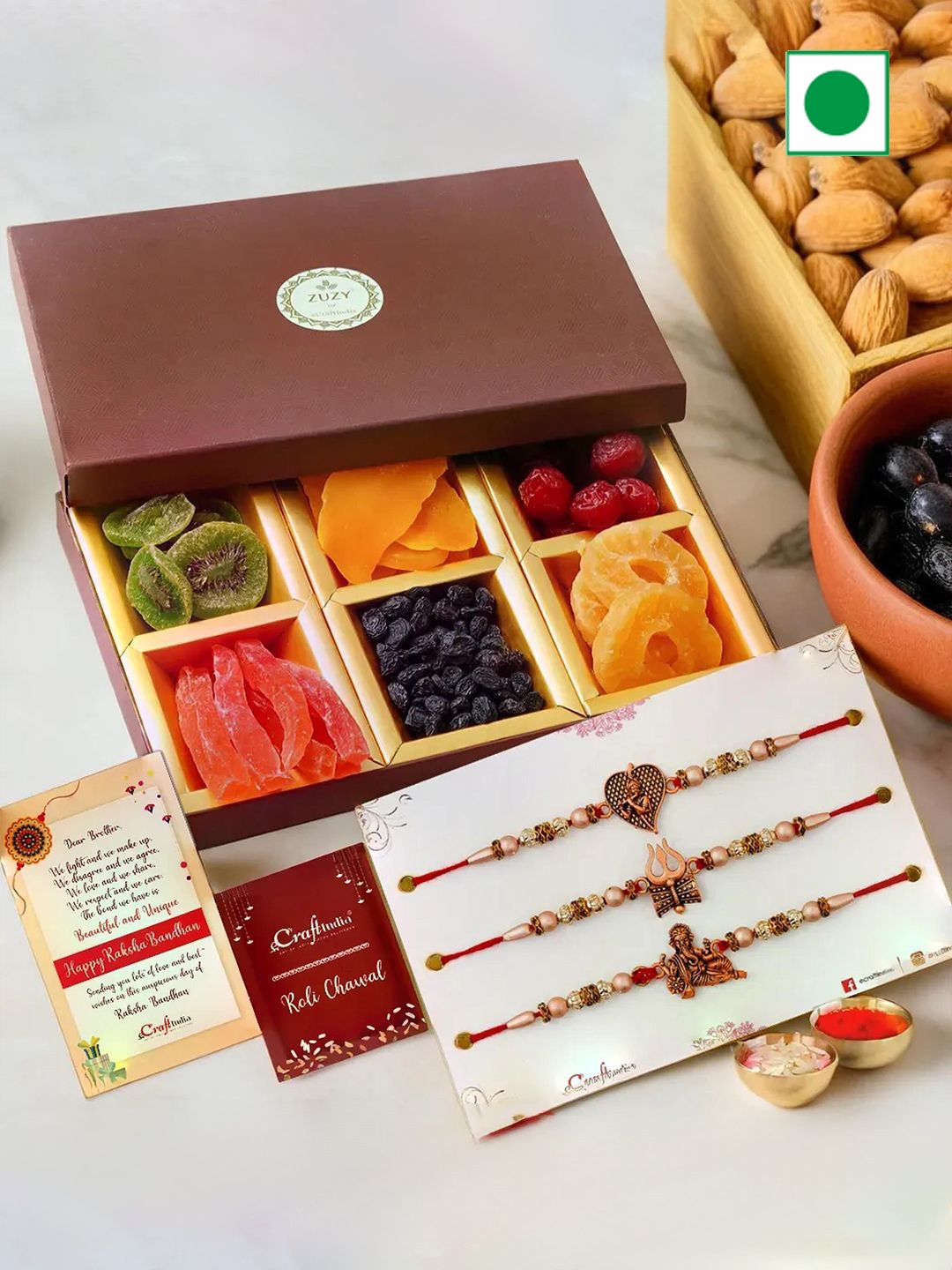 

eCraftIndia Set of 4 Designer Rakhis With Zuzy Sun Dried Fruit Box and Roli Chawal Pack, Gold