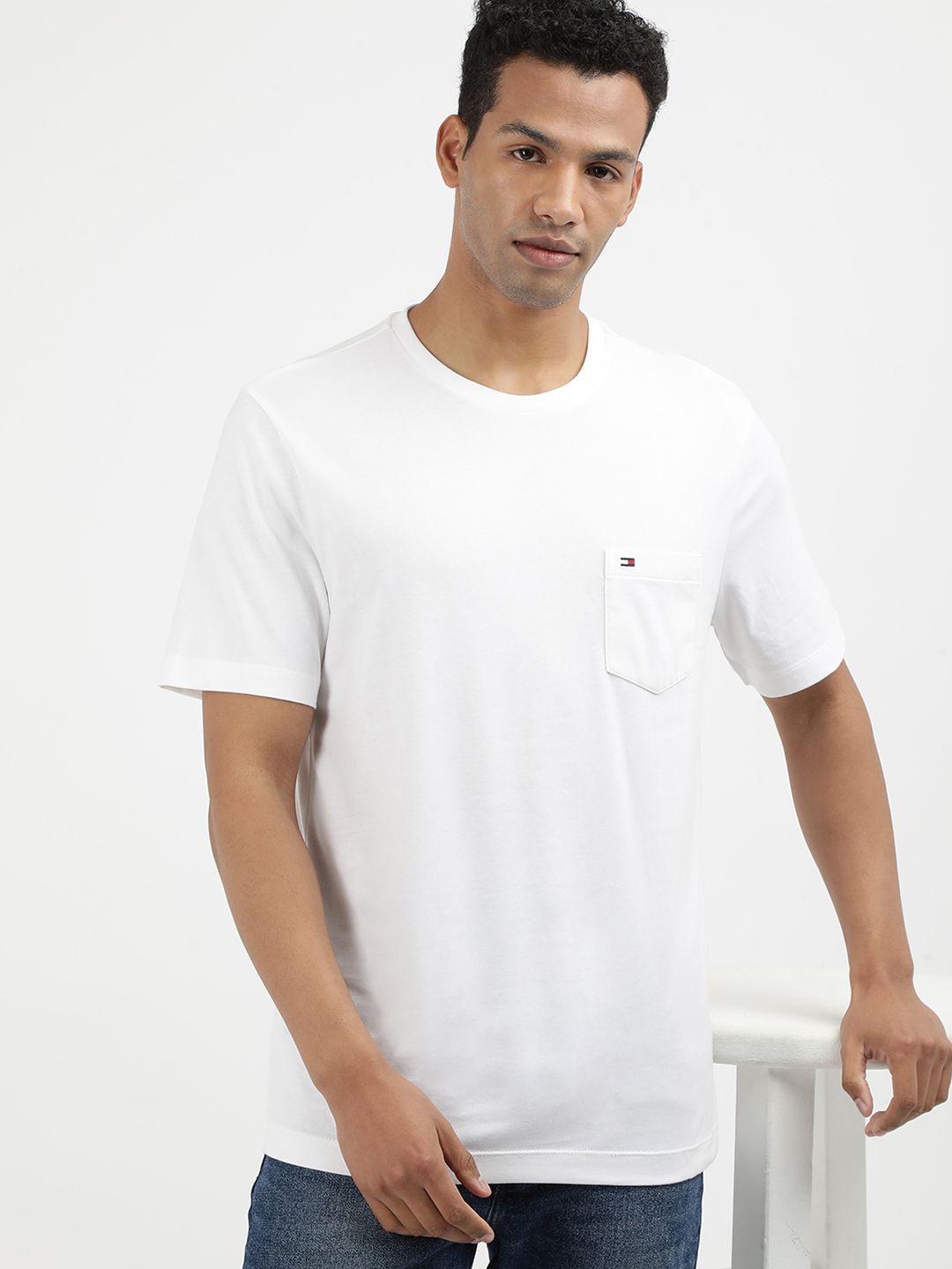 

Tommy Hilfiger Men Solid Round Neck Cotton T-shirt, White