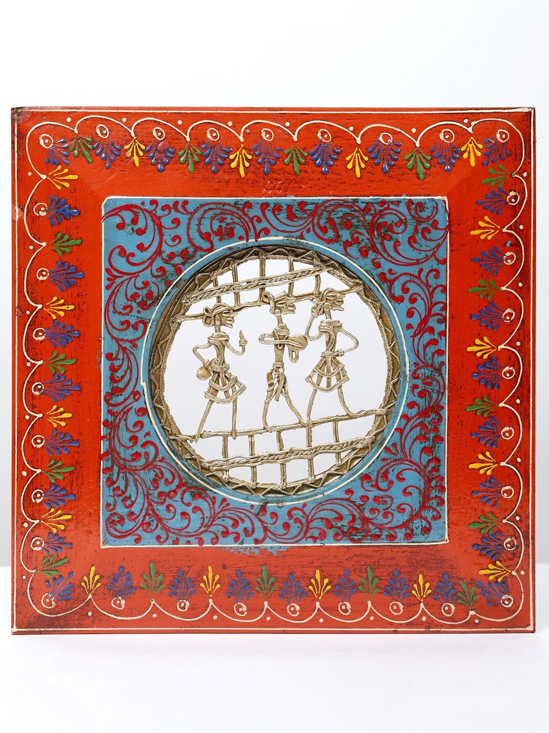 

Exotic India 11" Hand-Painted Wall Hanging Wooden Framed Tribal Dance Trio in Brass, Red