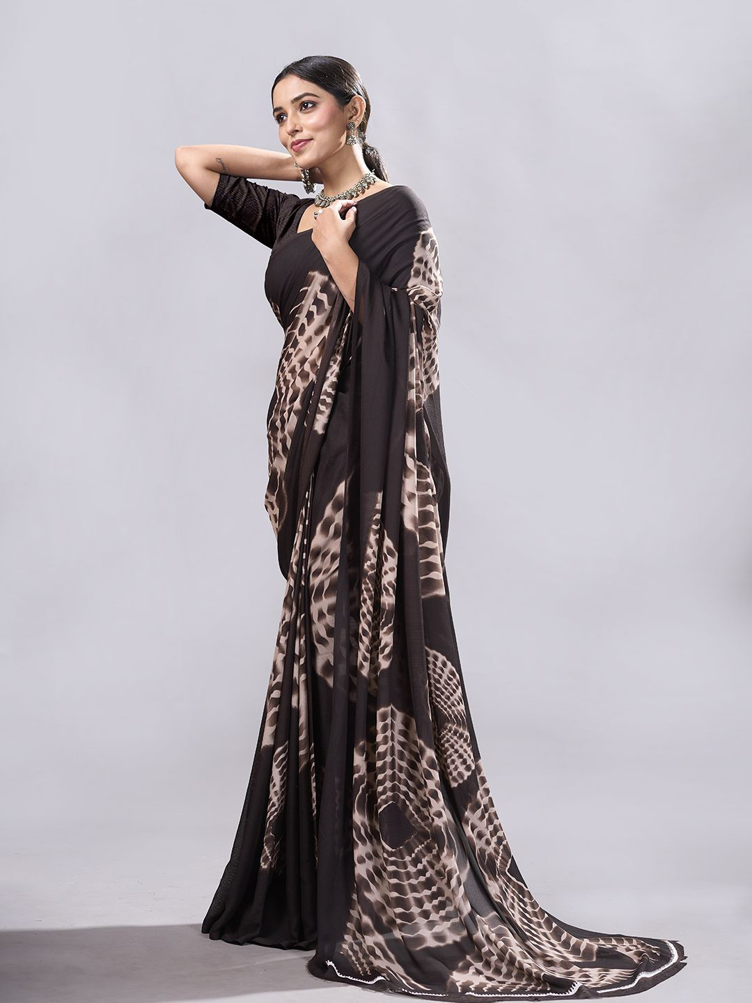 

NIRMAL CREATION Printed Poly Georgette Saree, Brown