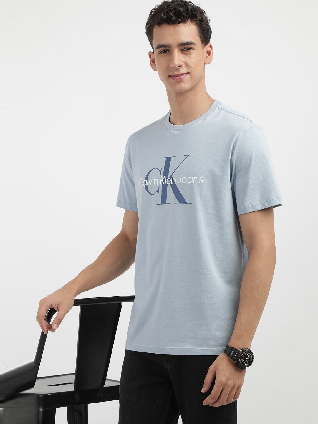 

Calvin Klein Jeans Men Typography Printed Round Neck Cotton T-shirt, Blue