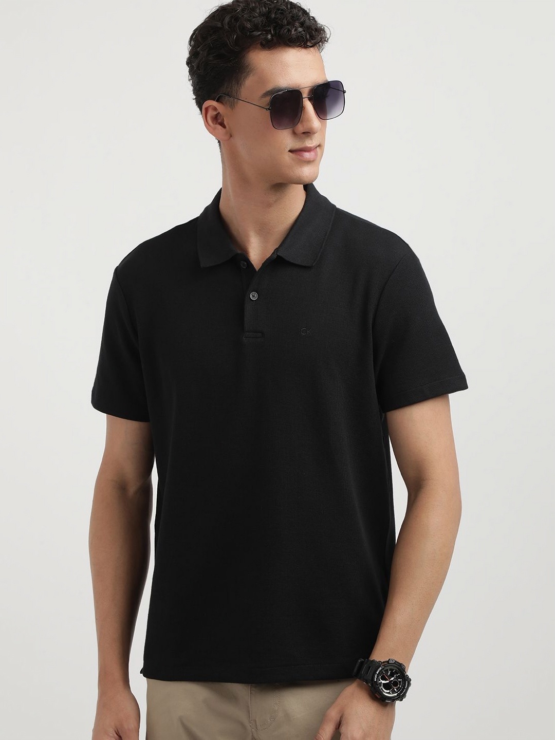 

Calvin Klein Jeans Men Solid Polo Collar Cotton T-shirt, Black