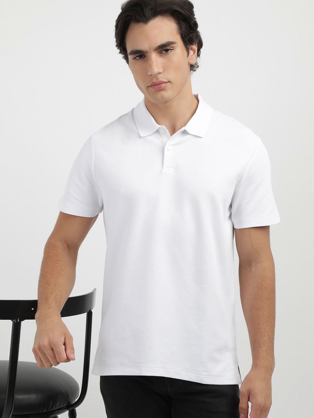 

Calvin Klein Jeans Men Solid Polo Collar Cotton T-shirt, White