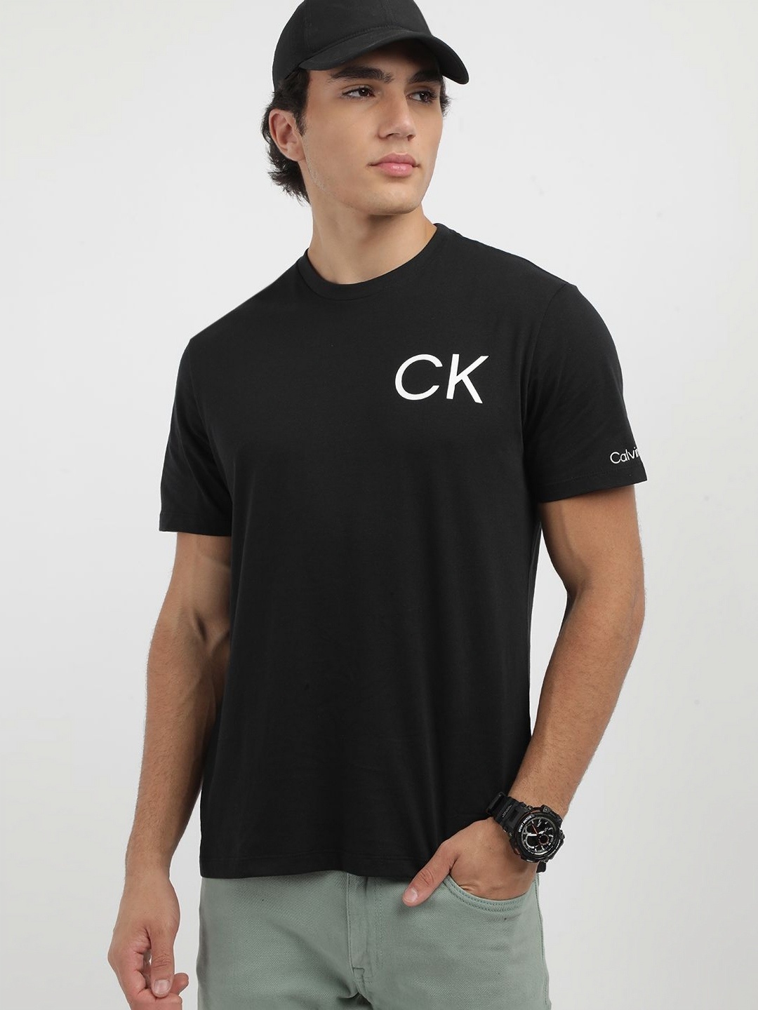 

Calvin Klein Jeans Men Solid Round Neck Cotton T-shirt, Black