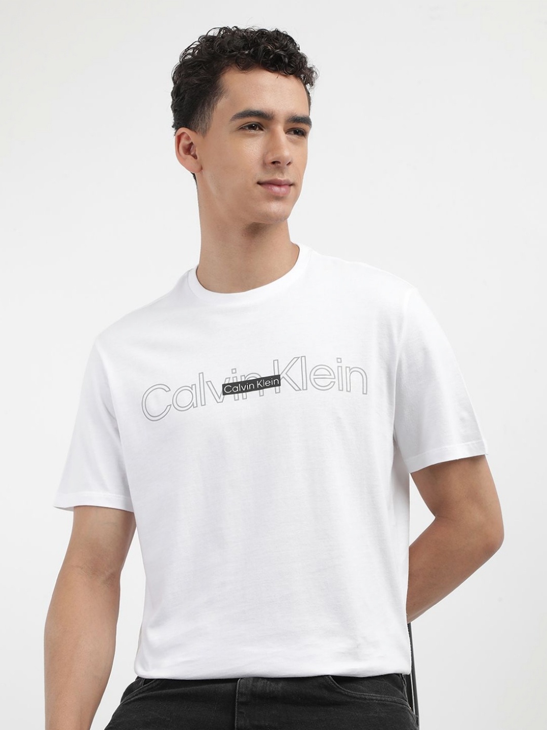 

Calvin Klein Jeans Men Solid Round Neck Cotton T-shirt, White