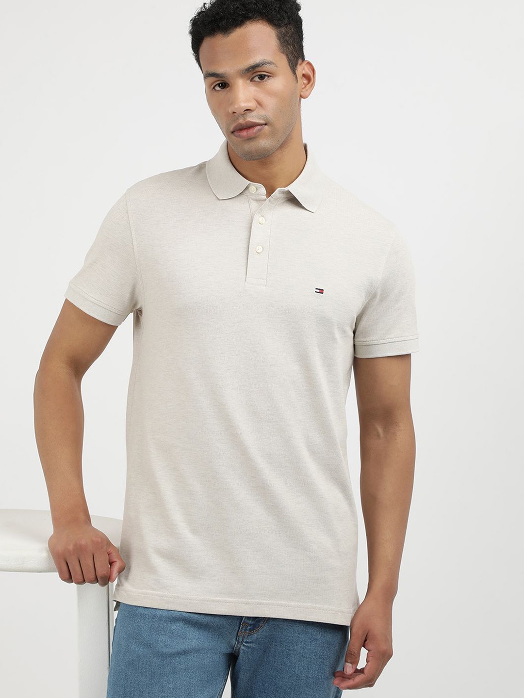 

Tommy Hilfiger Men Solid Polo Collar Cotton Slim Fit T-shirt, Beige
