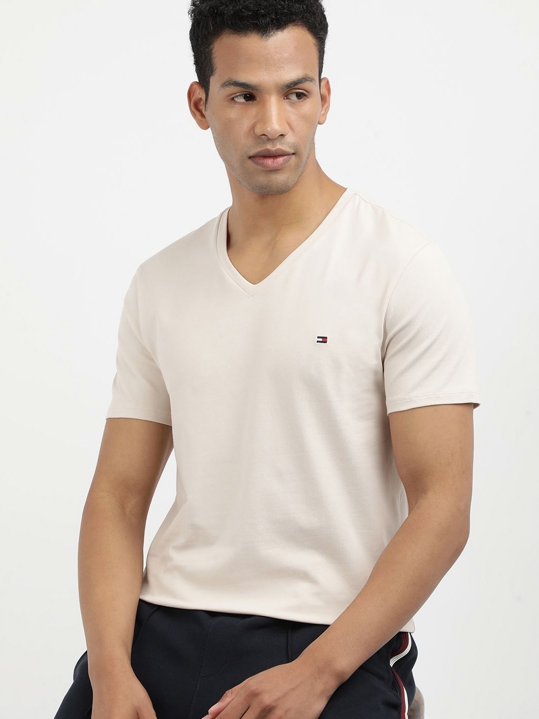 

Tommy Hilfiger Men Solid V-Neck Cotton Slim Fit T-shirt, Off white