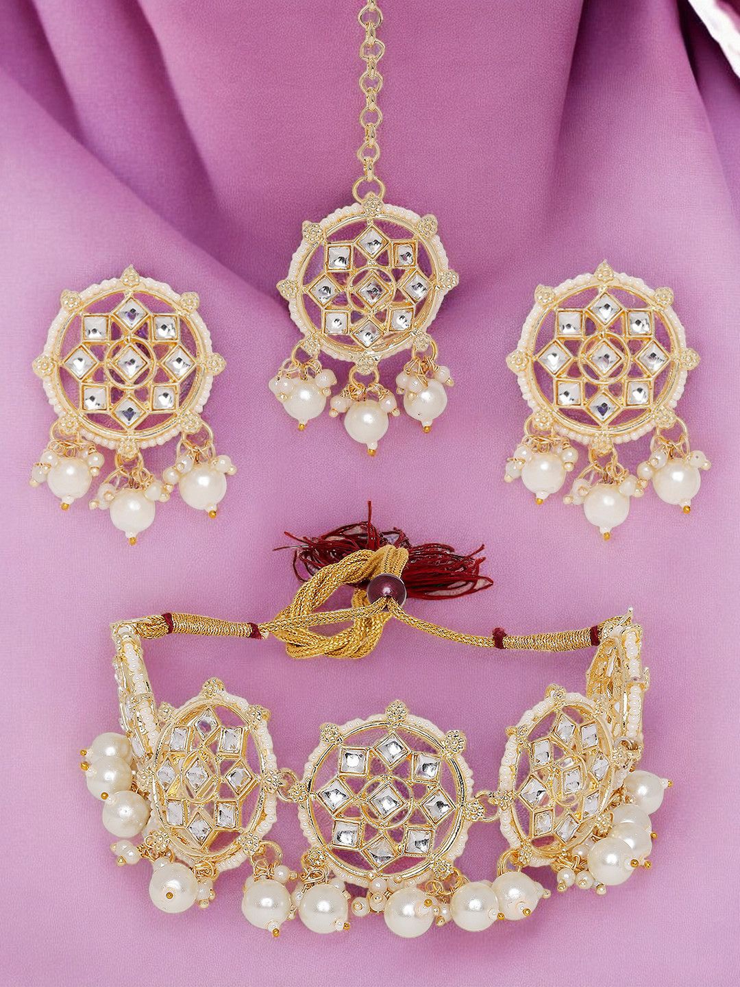 

Anouk Gold Toned Gold Kundan & Pearls Jewellery Set