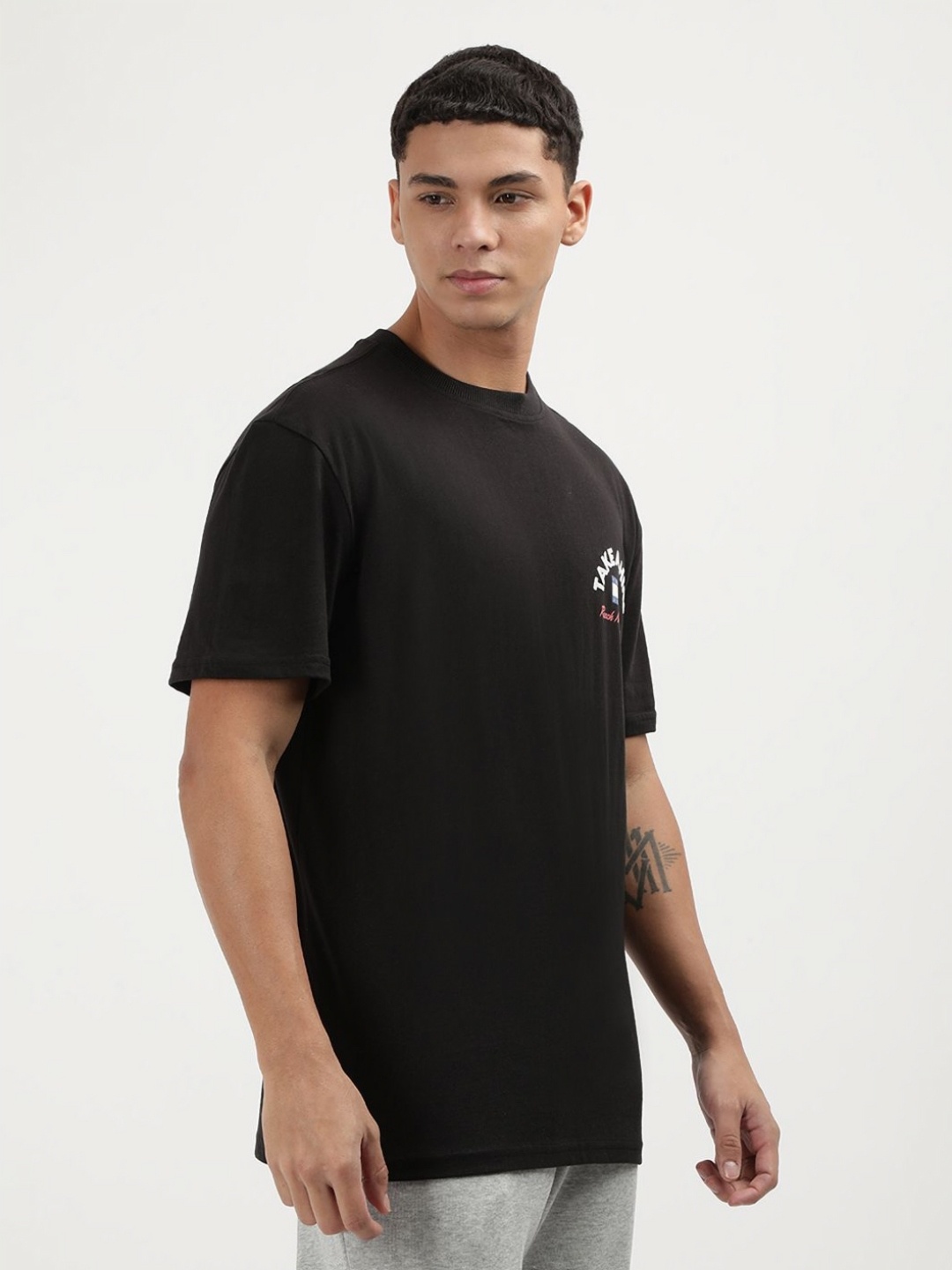 

Tommy Hilfiger Men Typography Printed Round Neck Cotton Tshirt, Black