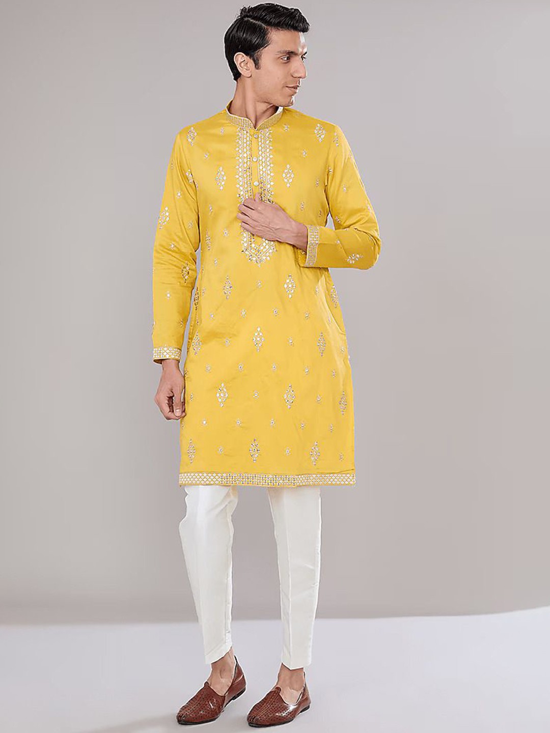 

RNG Safawala Ethnic Motifs Embroidered Regular Mirror Work Raw Silk Kurta With Trousers, Mustard