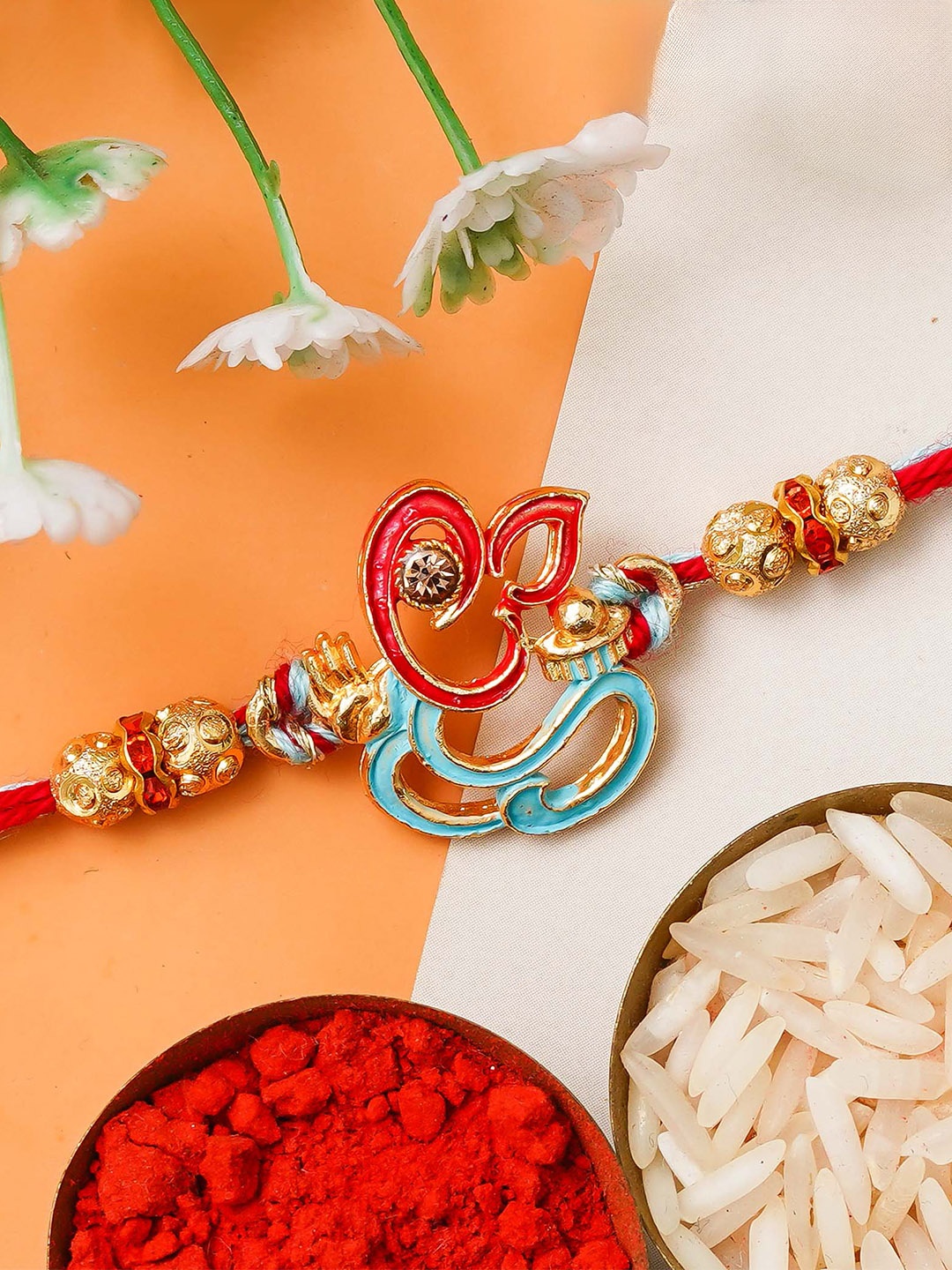 

eCraftIndia Beaded & Ganesha Charm Thread Rakhi With Roli Chawal, Gold