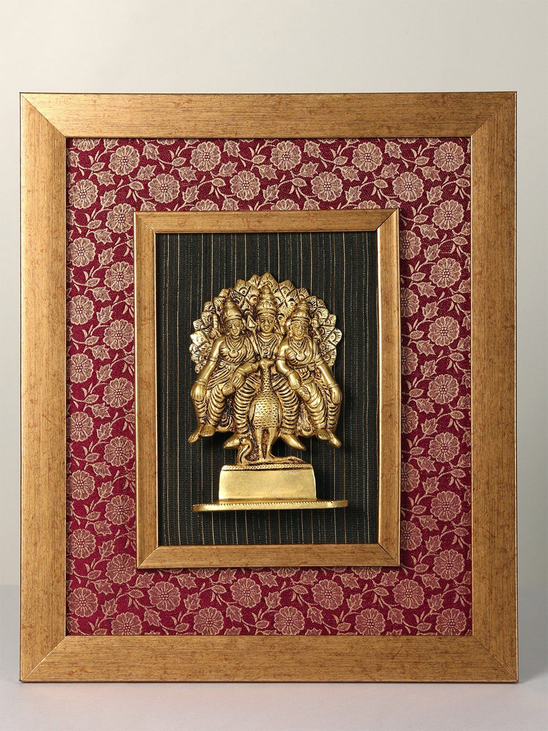 

Exotic India 15" Wall Hanging Wood Framed Lord Murugan with Valli and Deivanai in Brass, Gold