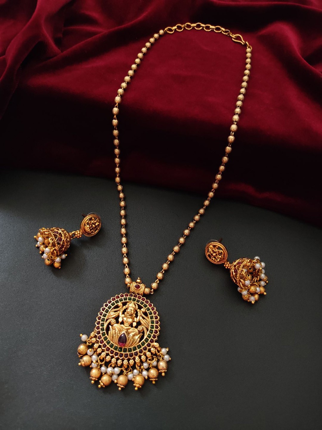 

Pihtara Jewels Gold-Plated Stone-Studded & Beaded Goddess Lakshmi Jewellery Set