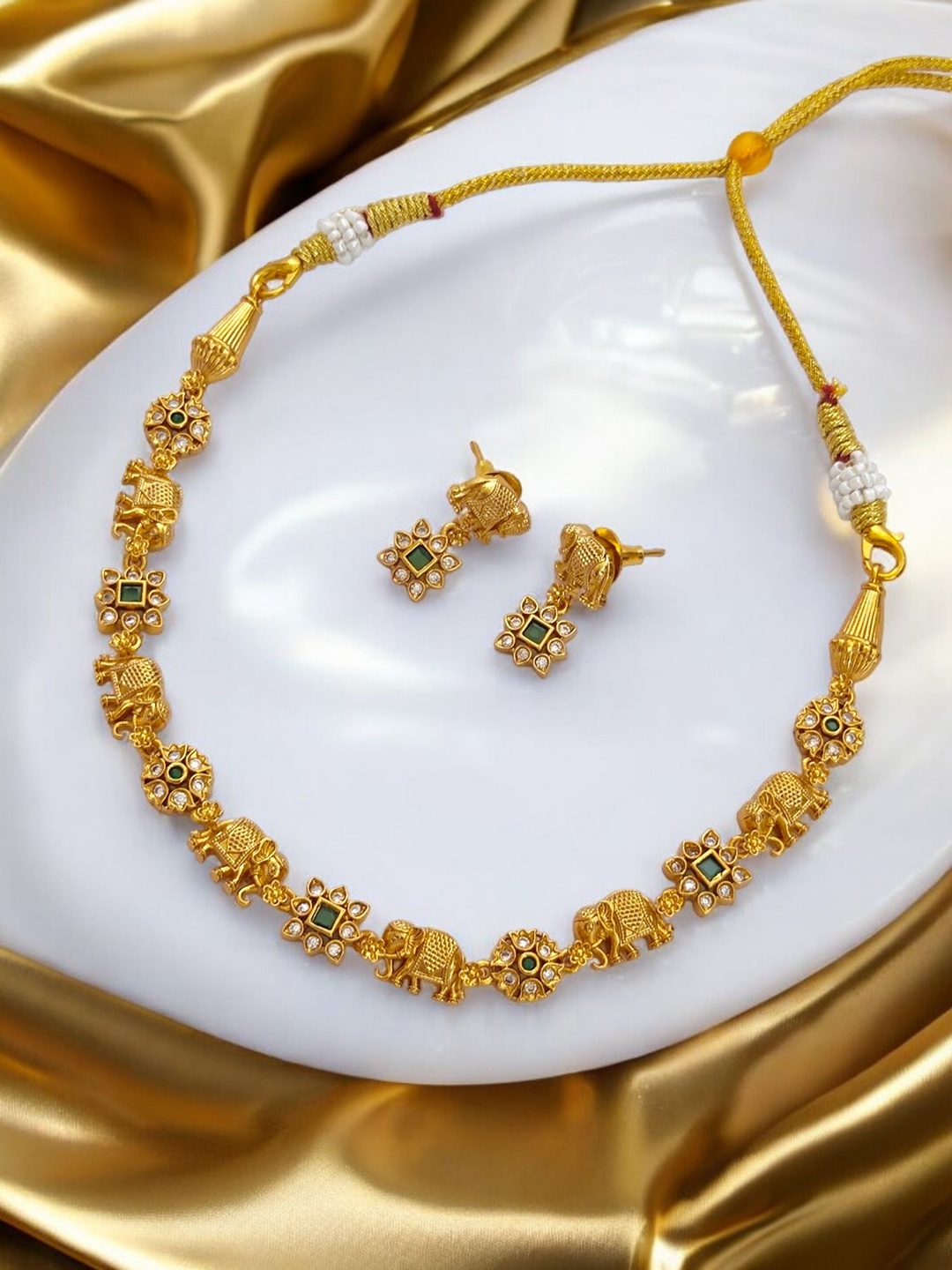 

Pihtara Jewels Gold-Plated Stones Studded Elephant Motif Temple Jewellery Set