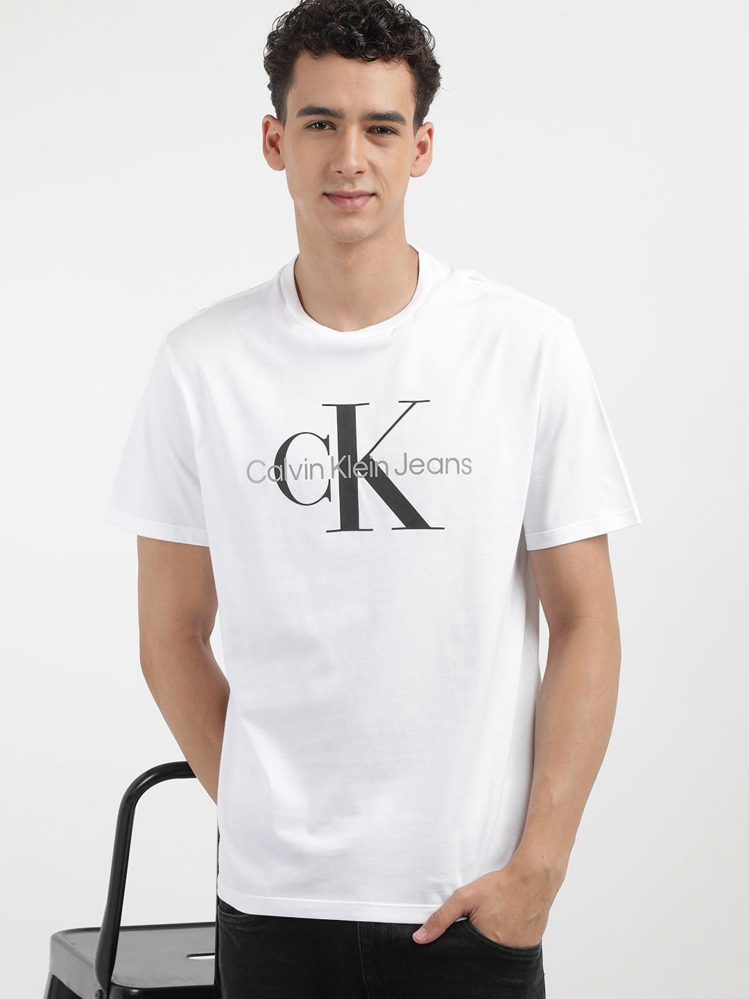 

Calvin Klein Jeans Men Typography Printed Round Neck Cotton T-shirt, White