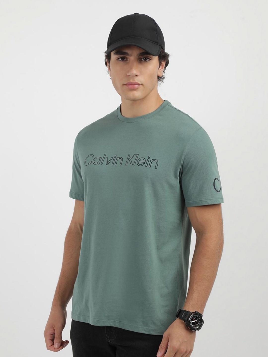 

Calvin Klein Jeans Men Typography Printed Round Neck Cotton T-shirt, Green