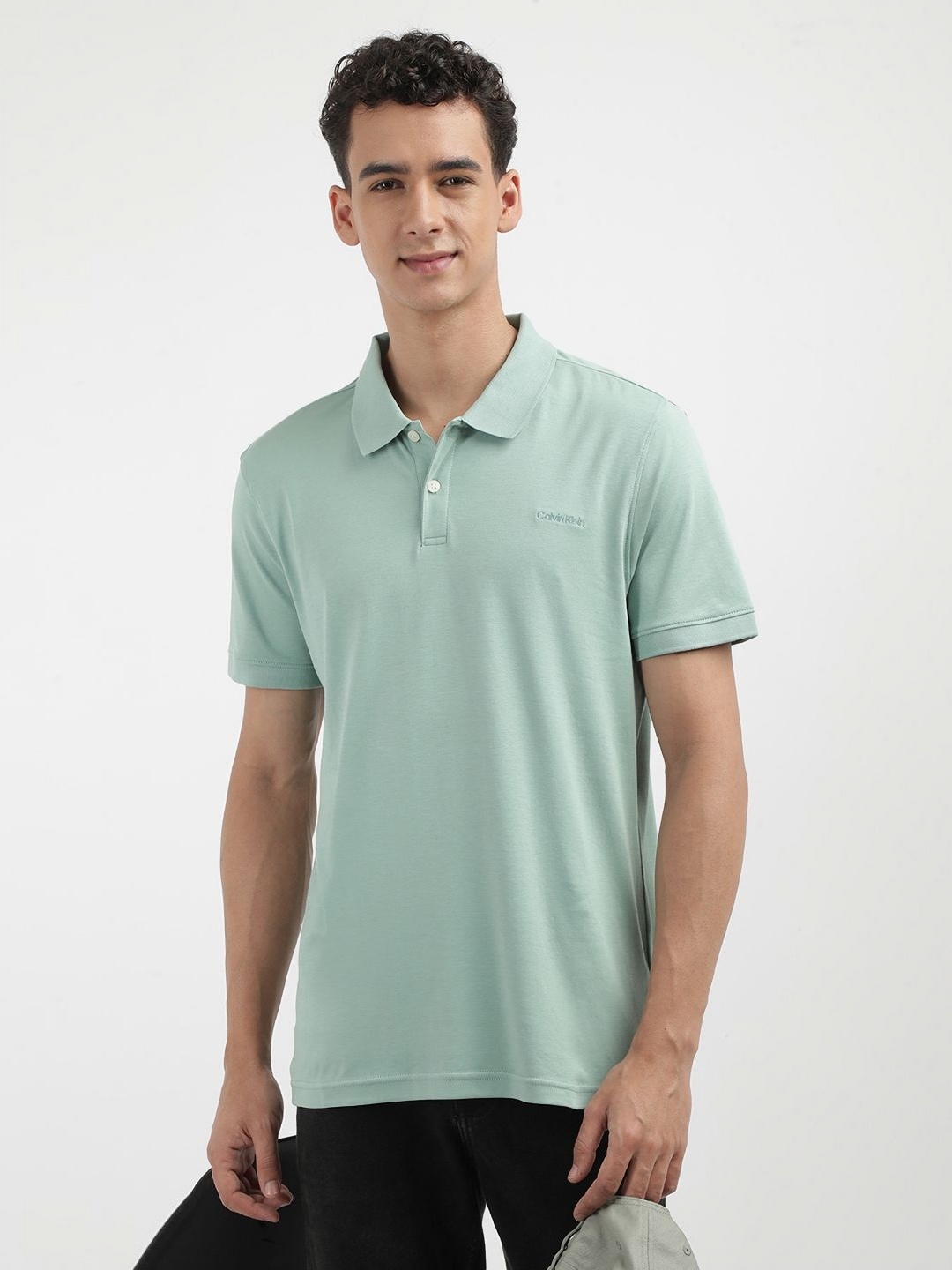 

Calvin Klein Jeans Men Solid Polo Collar Cotton T-shirt, Green