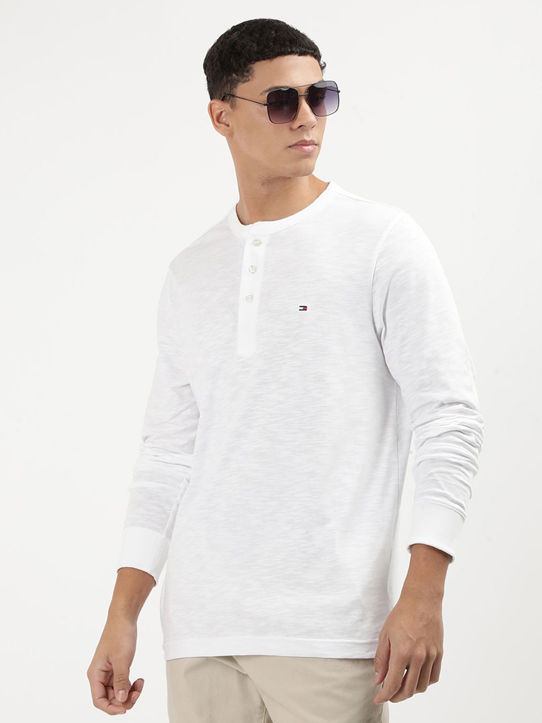

Tommy Hilfiger Men Solid Henley Neck Cotton T-shirt, White