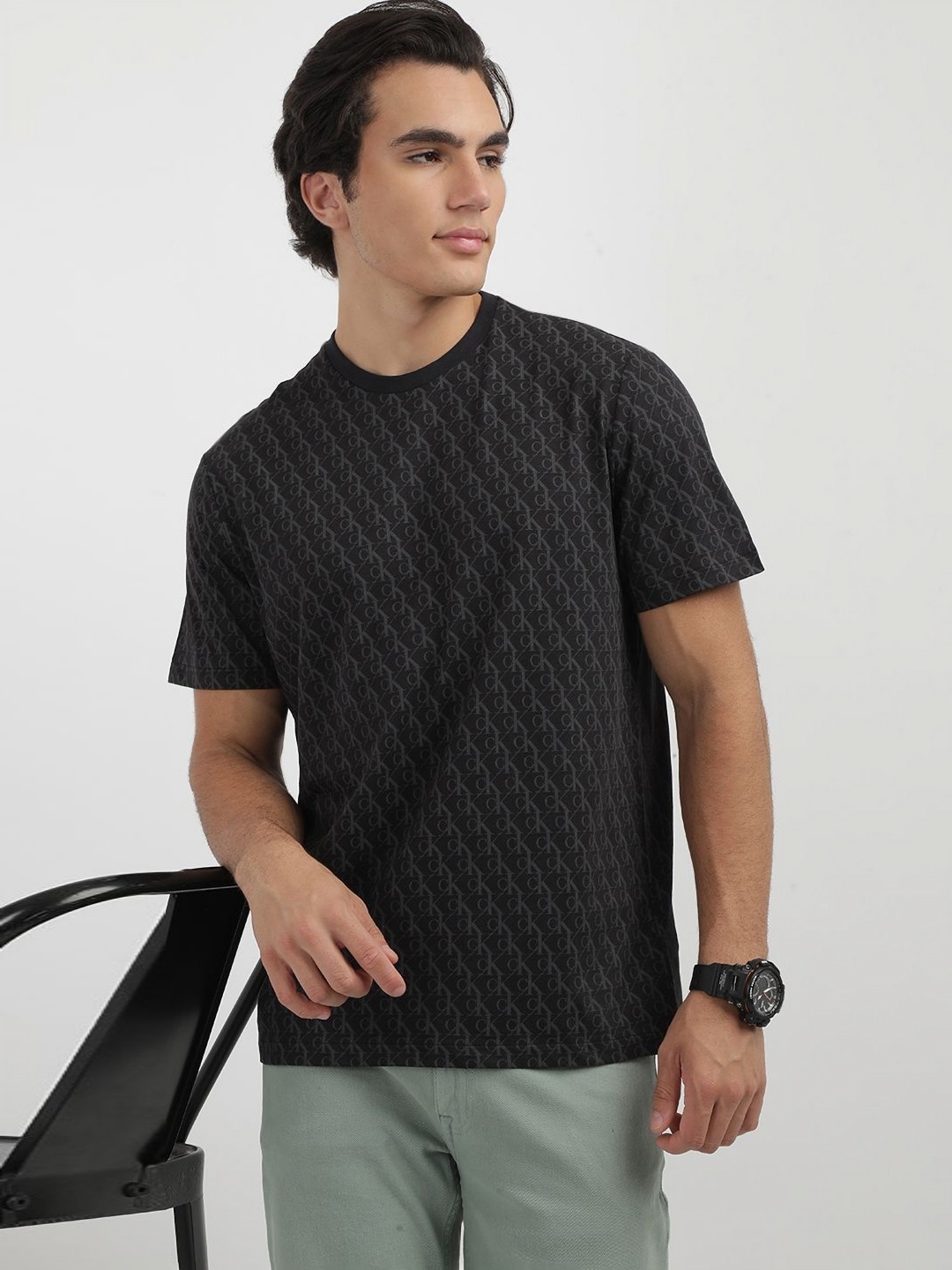 

Calvin Klein Jeans Men Typography Printed Round Neck Cotton T-shirt, Black