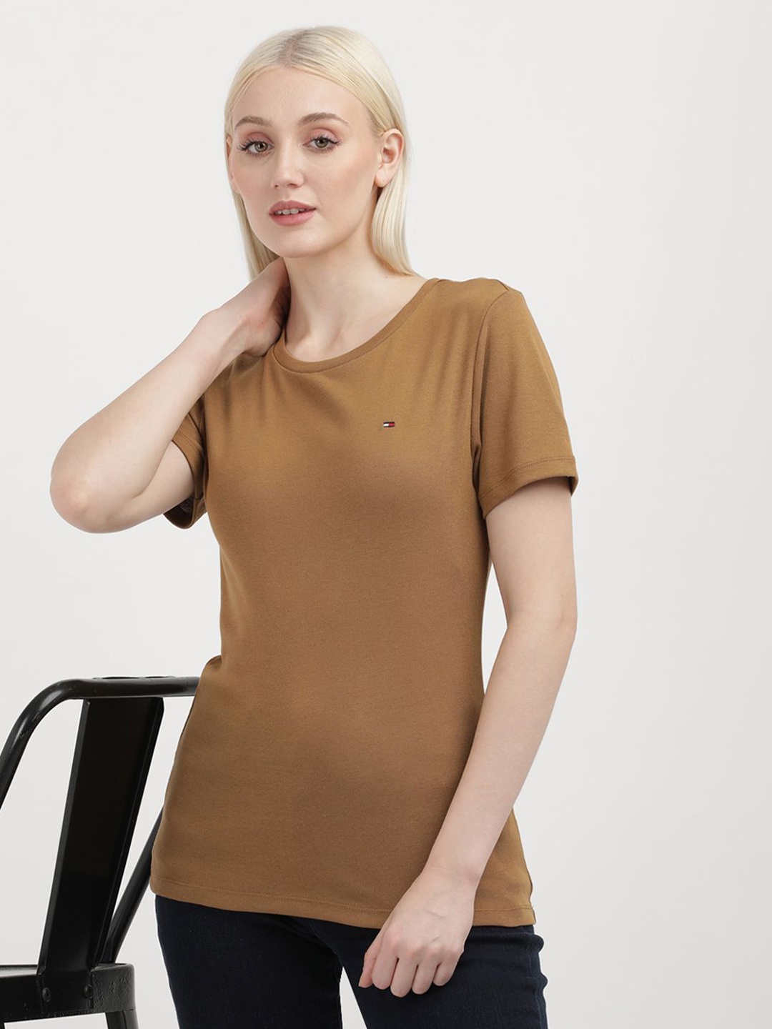 

Tommy Hilfiger Women Solid Round Neck Cotton T-shirt, Brown