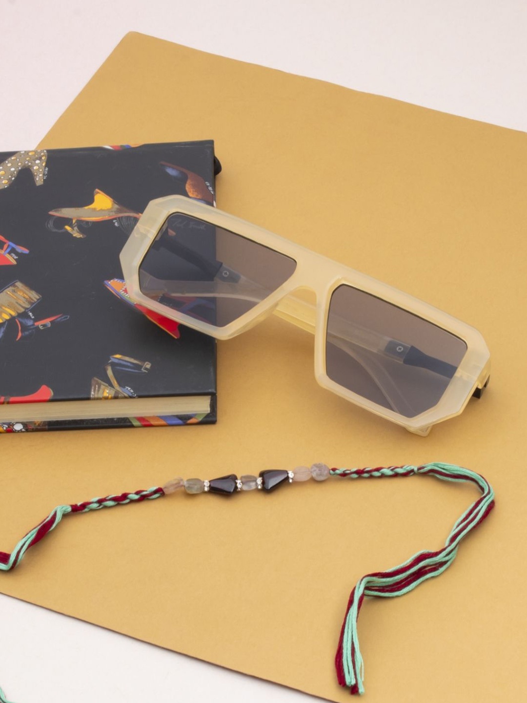 

Ted Smith Stones Studded & Beaded Rakhi With Sunglass, Off white