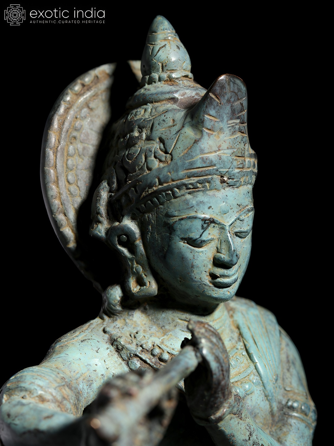 

Exotic India Turquoise Blue Religious Idol Showpiece