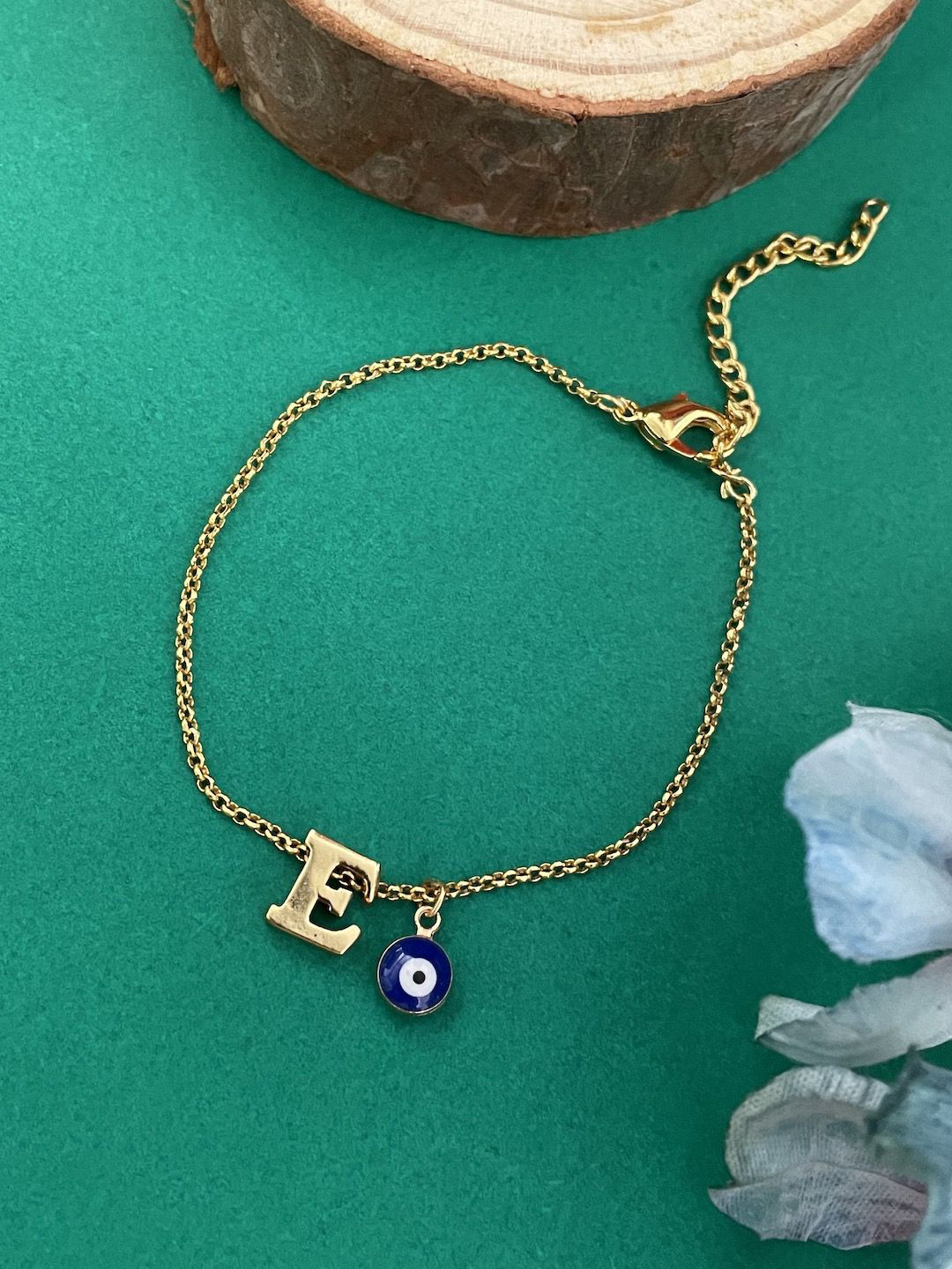 

Digital Dress Room X Letter Evil Eye Name Bracelet Rakhi, Gold