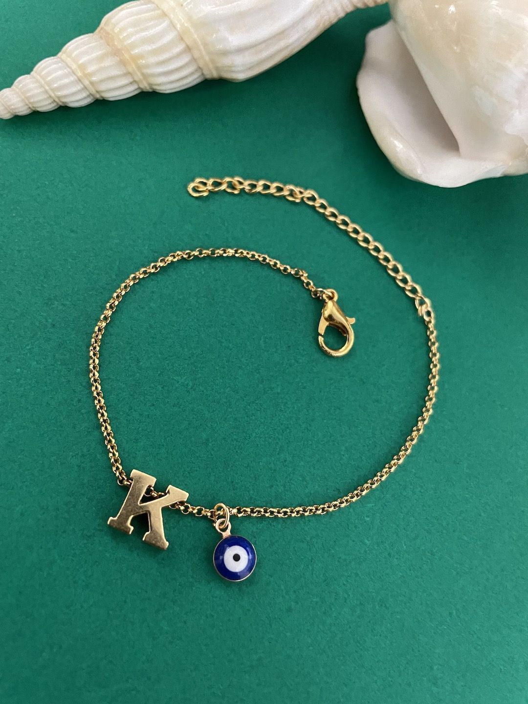 

Digital Dress Room Gold Plated Evil Eye Charm K Initial Bracelet Rakhi
