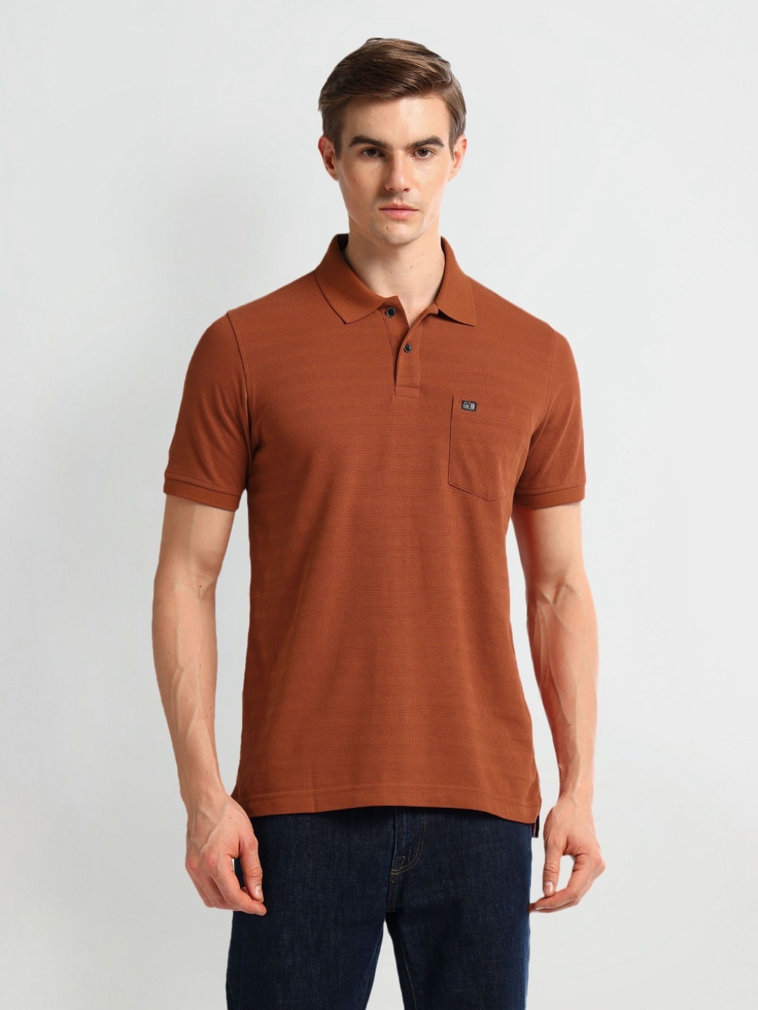 

Arrow Sport Men Solid Polo Collar Cotton T-Shirt, Orange