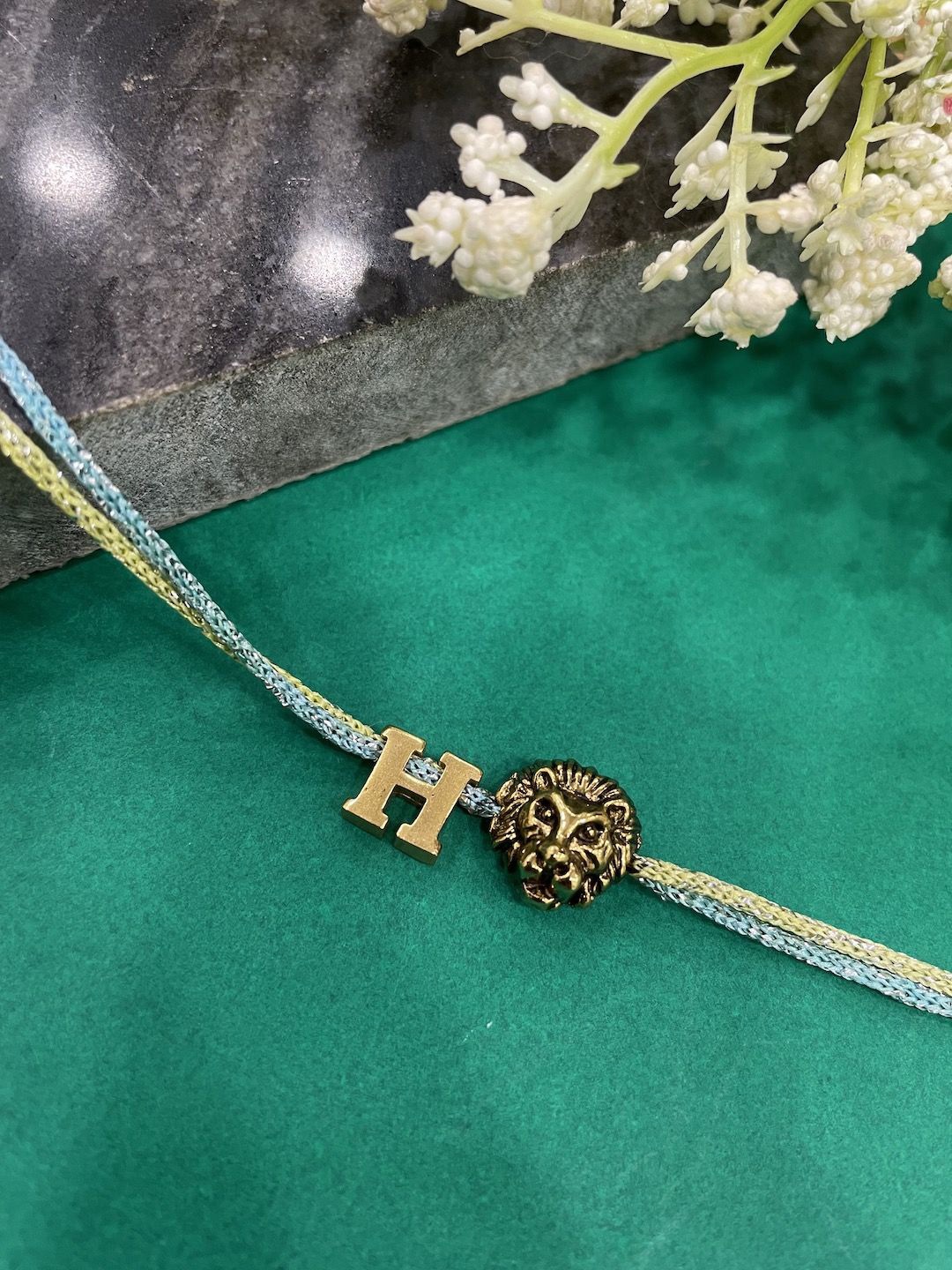 

Digital Dress Room H Initial Lion Charm Thread Rakhi, Gold