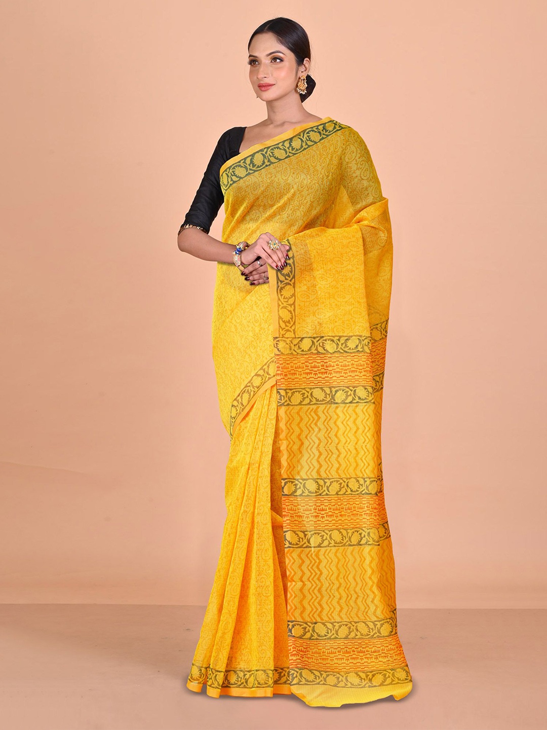 

Unnati Silks Ethnic Motifs Supernet Handloom Block Print Saree, Yellow