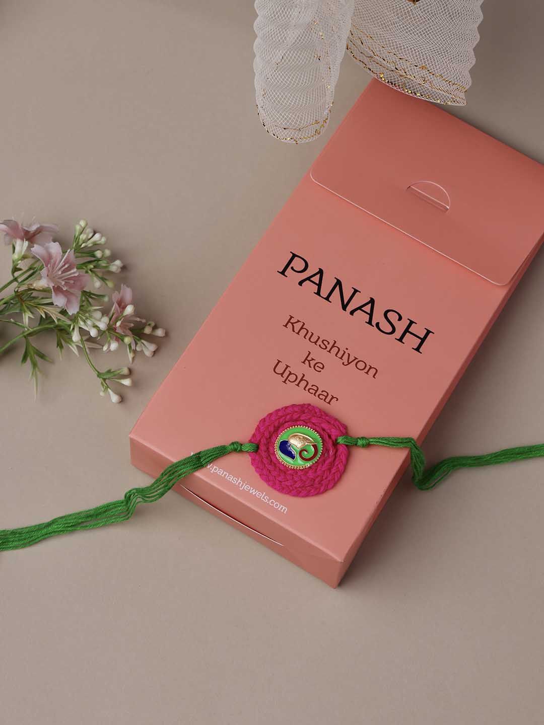 

PANASH Gold Plated Elephant Shaped Rakhi With Roli Chawal
