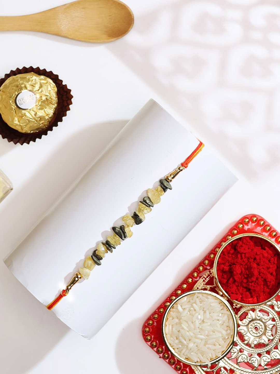 

Shubhanjali Pyrite Citrine Crystal Chips Beaded Rakhi With Roli Rice & Greeting Card, Yellow