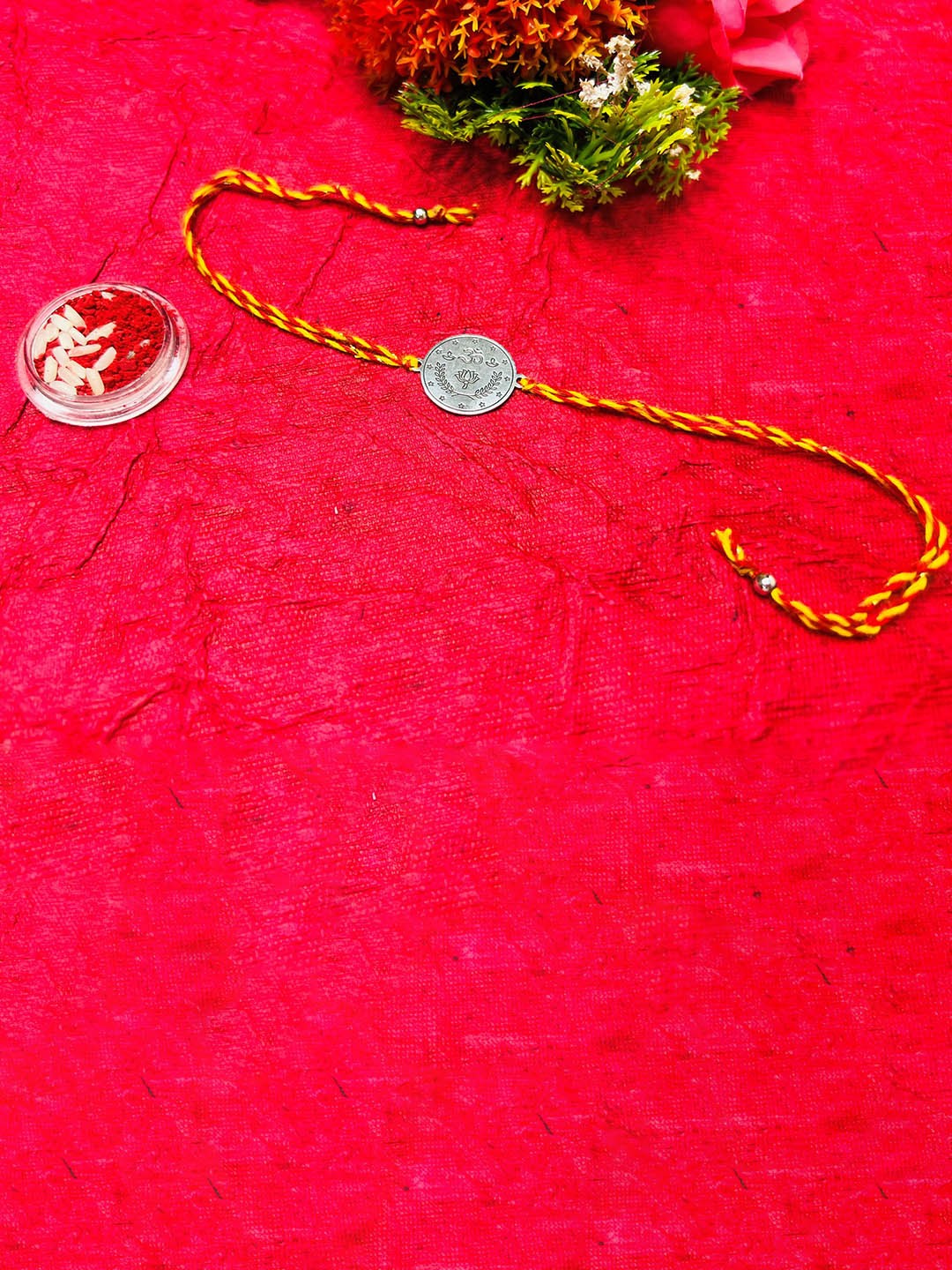 

Arte Jewels 92.5 Silver Om Thread Rakhi