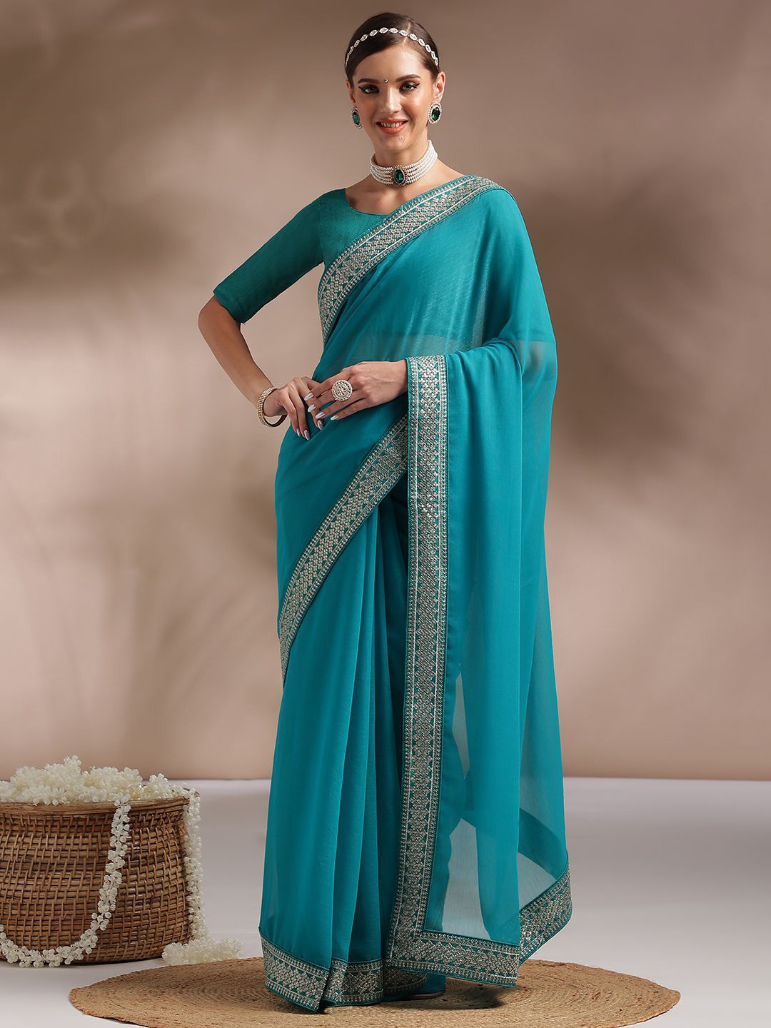 

Saree mall Ethnic Motifs Embroidered Solid Sarees, Blue